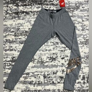 Nike Gray Athletic Leggings with Metallic Logo on leg – NWT